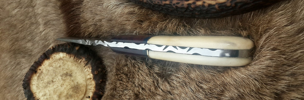 Damascus Steel Drop Point Skinning Knife with Bone and Rosewood Handle – 7 Inch Overall Length