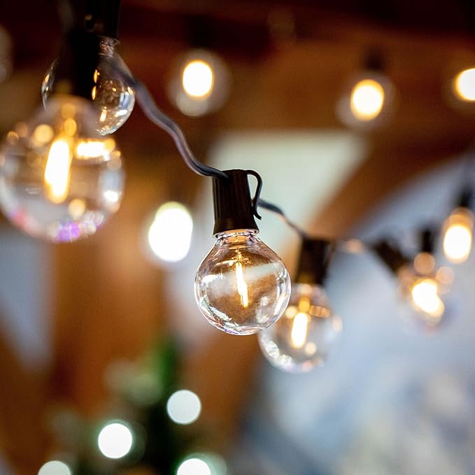 Novelty Lights 100 Feet G40 LED Patio String Lights with 67 Bulbs, Warm White, Weather Resistant and Shatterproof Replaceable Plastic Globe Bulbs, Green Wire