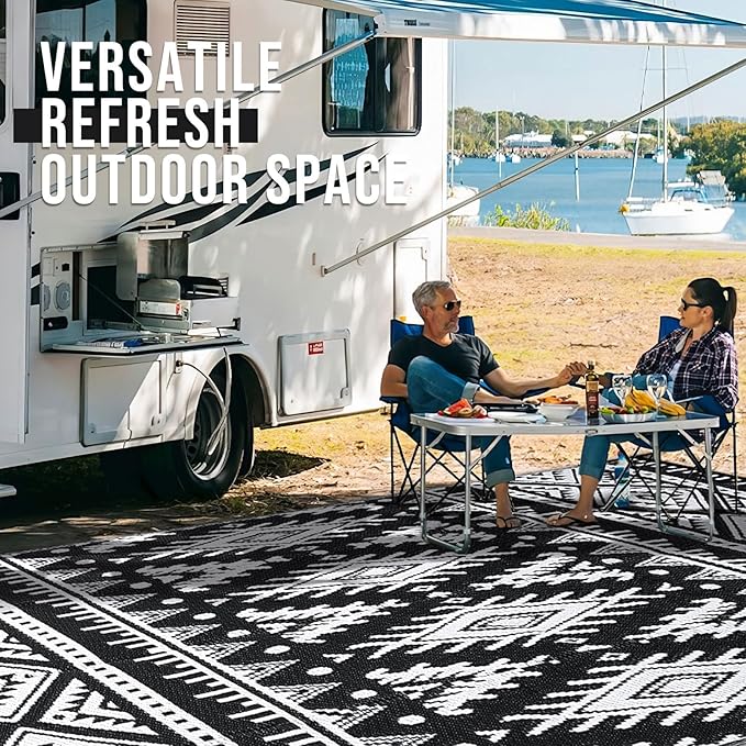 OLANLY Outdoor Rug Waterproof 10x14 ft, Reversible Outdoor Plastic Straw Rug, Boho Patio Rug, Indoor Outdoor Carpet, RV Mat Outside for Patio, Camp, Picnic, Balcony, Deck, Backyard, Black & White