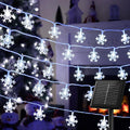 Brightown Solar Christmas Snowflake String Lights, 72FT 200 LED Outdoor Waterproof Fairy Lights with 8 Lighting Modes for Wedding, Party, Tree, Room, Garden, Patio, Yard, Home, Pure White