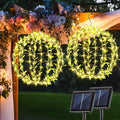 Solar Powered Hanging Iron Sphere Lights with Artificial Greenery – 12Inch 120 LED Waterproof Outdoor Decor Ball Light with Timer & 8 Modes – 2 Pack for Garden, Christmas, Weddings (Warm White)