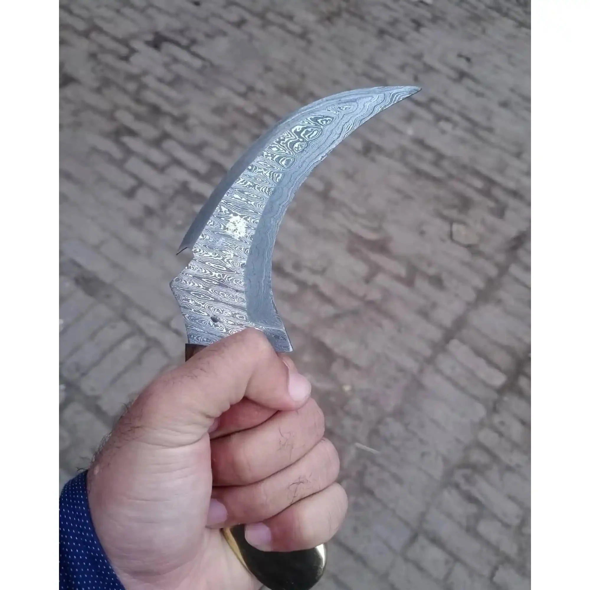 Damascus karambit knife..