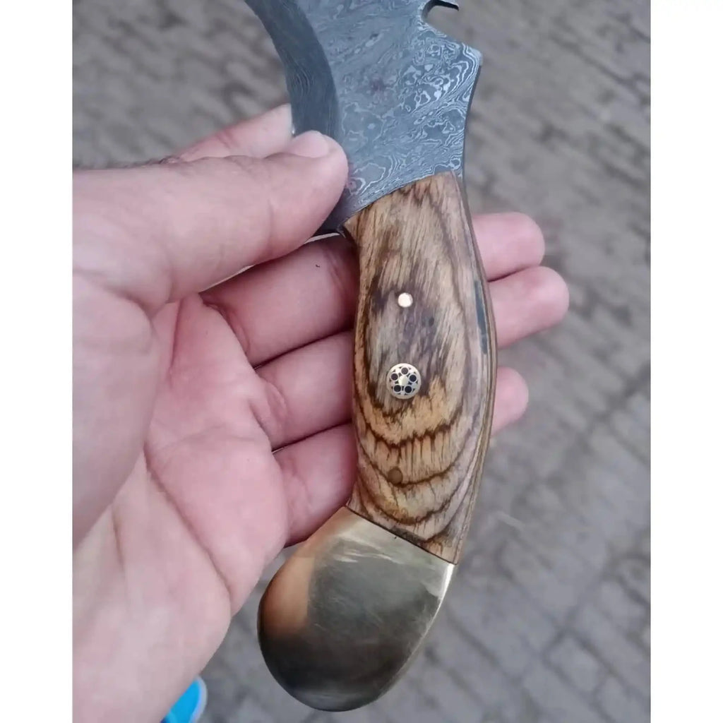 Damascus karambit knife..