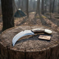 Damascus karambit knife..