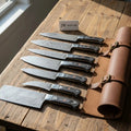 Hand-forged 7-Piece Damascus Chef Knife Set — Steel Bolsters, Black Pakka Wood Full-Tang Handles, Leather Carry Roll