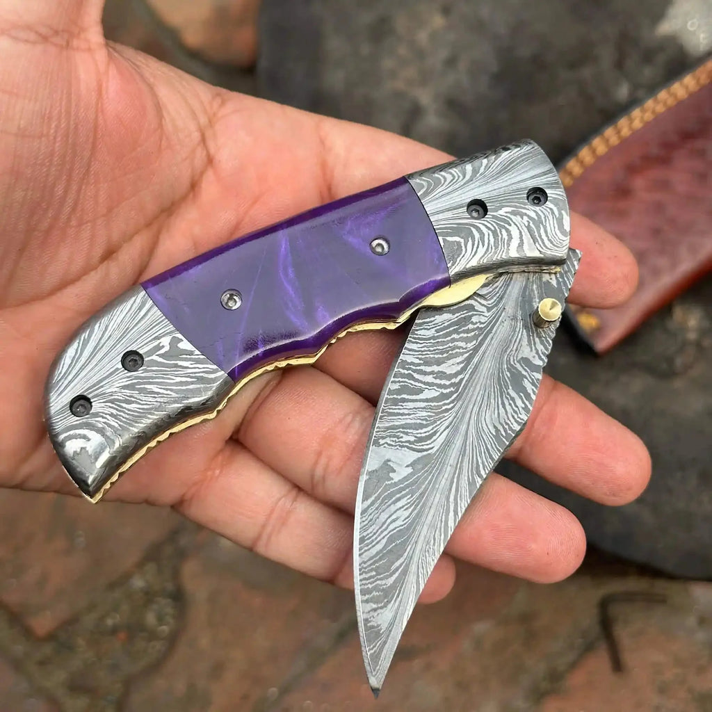 Handmade Feather Pattern Damascus Folding Knife with Purple Resin Handle & Leather Sheath