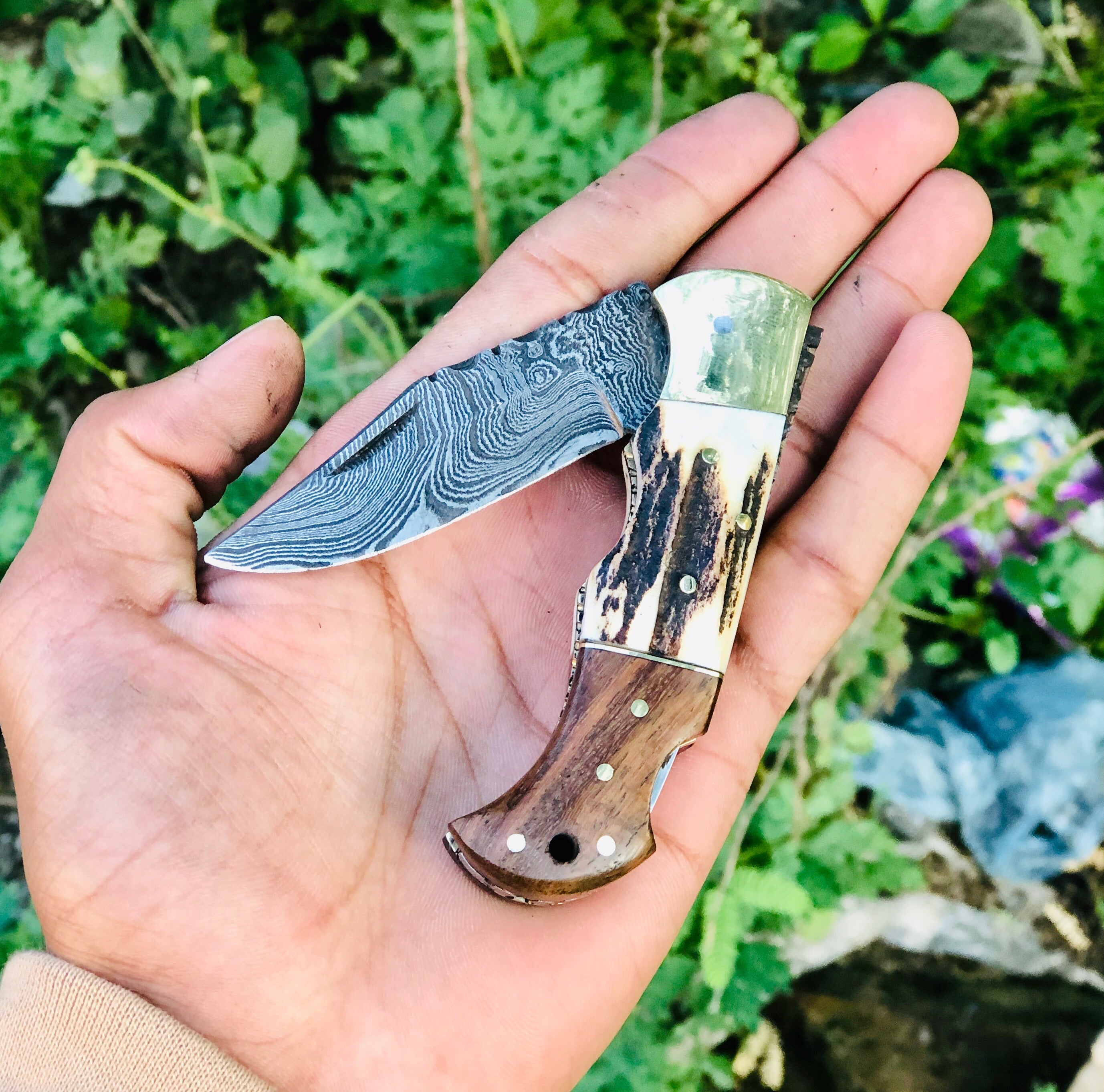 Custom Handmade Damascus Steel Folding Pocket Knife with Rosewood, Antler Horn, and Brass Bolster Handle and Leather Case